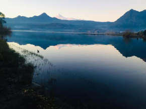 Cabañas Ruka Rayun vista y acceso al lago en Coñaripe